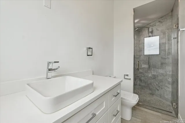 a utility room with washer and dryer