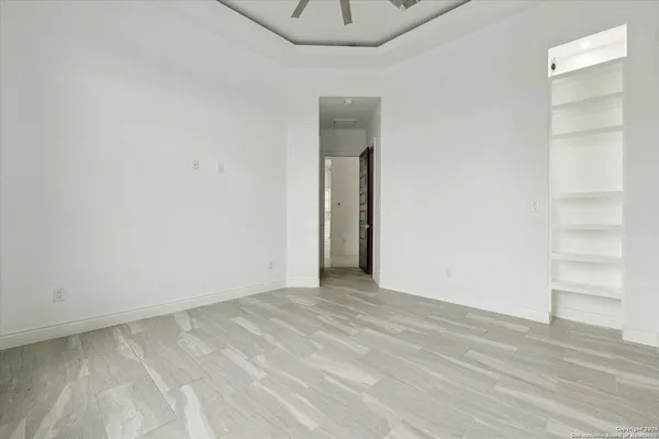 a view of an empty walk in closet