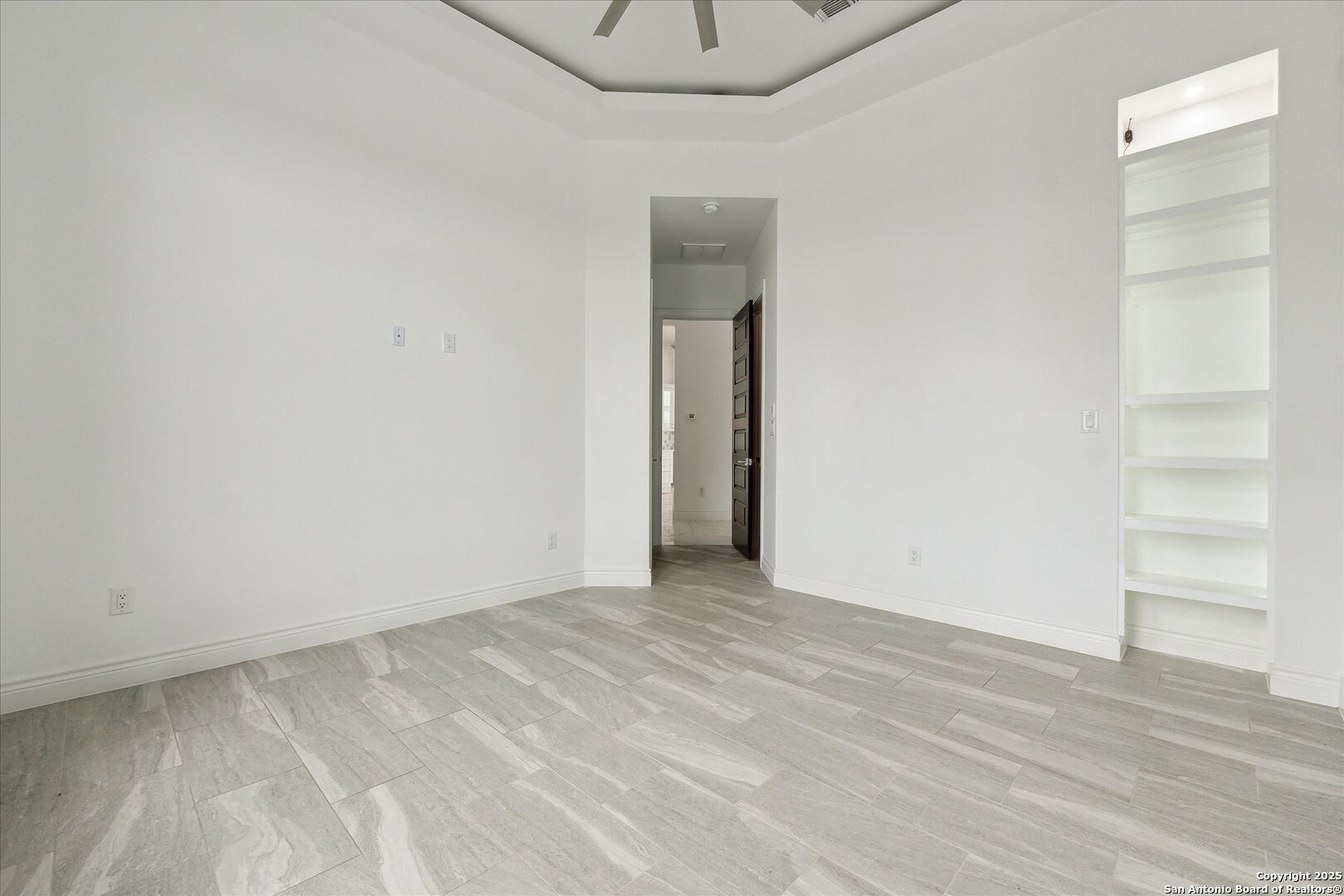 1799 County Road 651 Devine, TX 78016 - Photo 23 of 72 a view of an empty room with a window