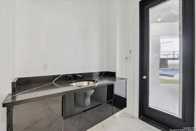 a view of a house with a yard and porch