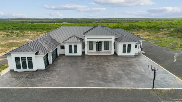 a house view with a garden space