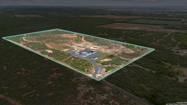 a view of a city with an ocean