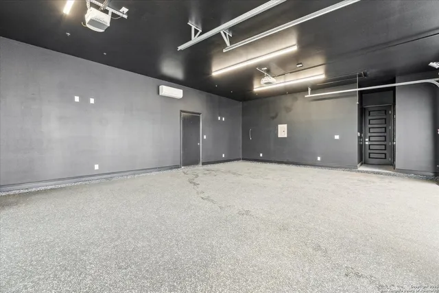 a view of a field with an ocean view