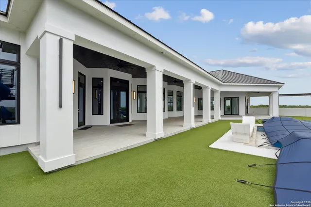 a view of a field with an ocean