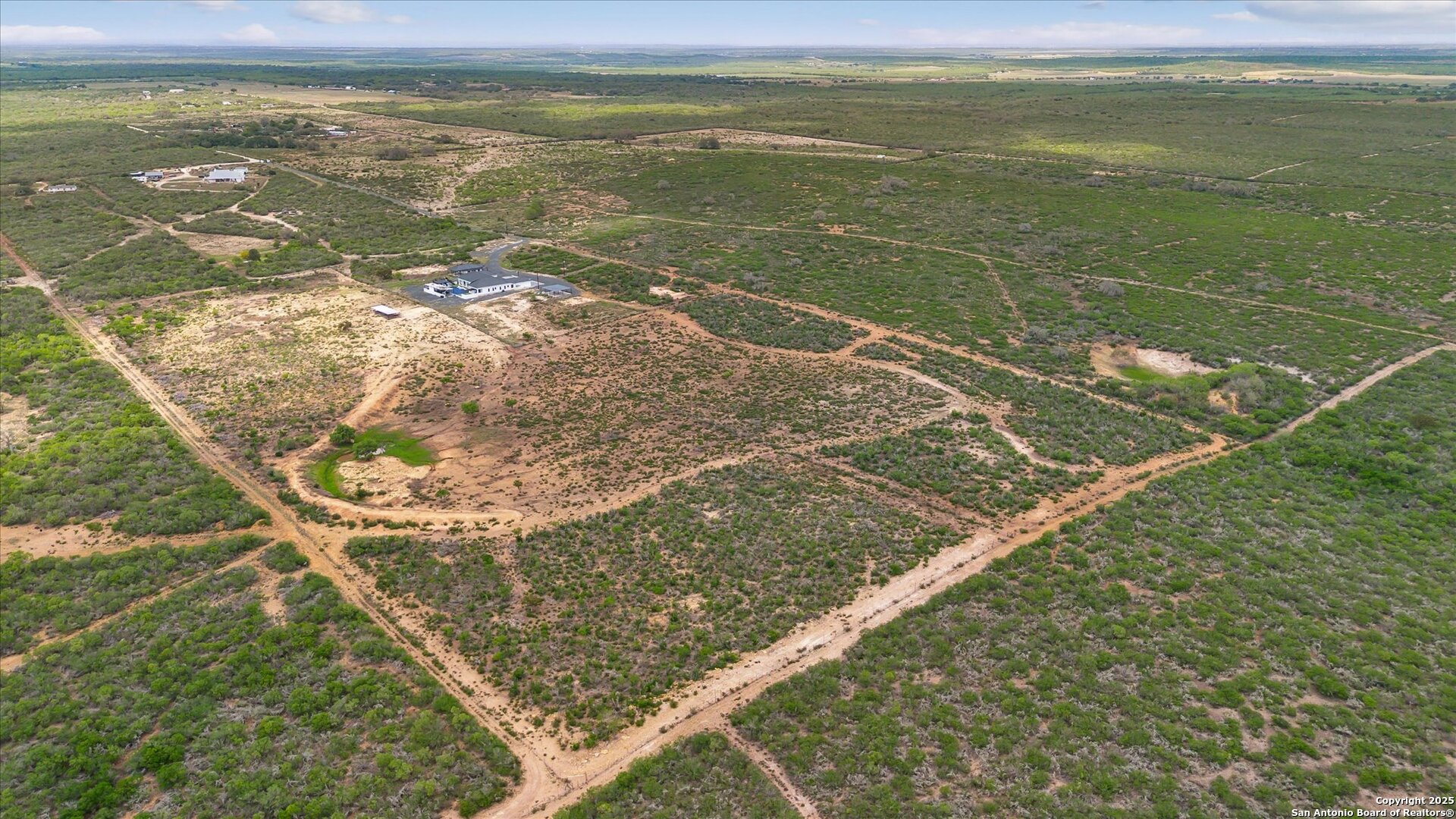 1799 County Road 651 Devine, TX 78016 - Photo 67 of 72 a view of a sky from a terrace