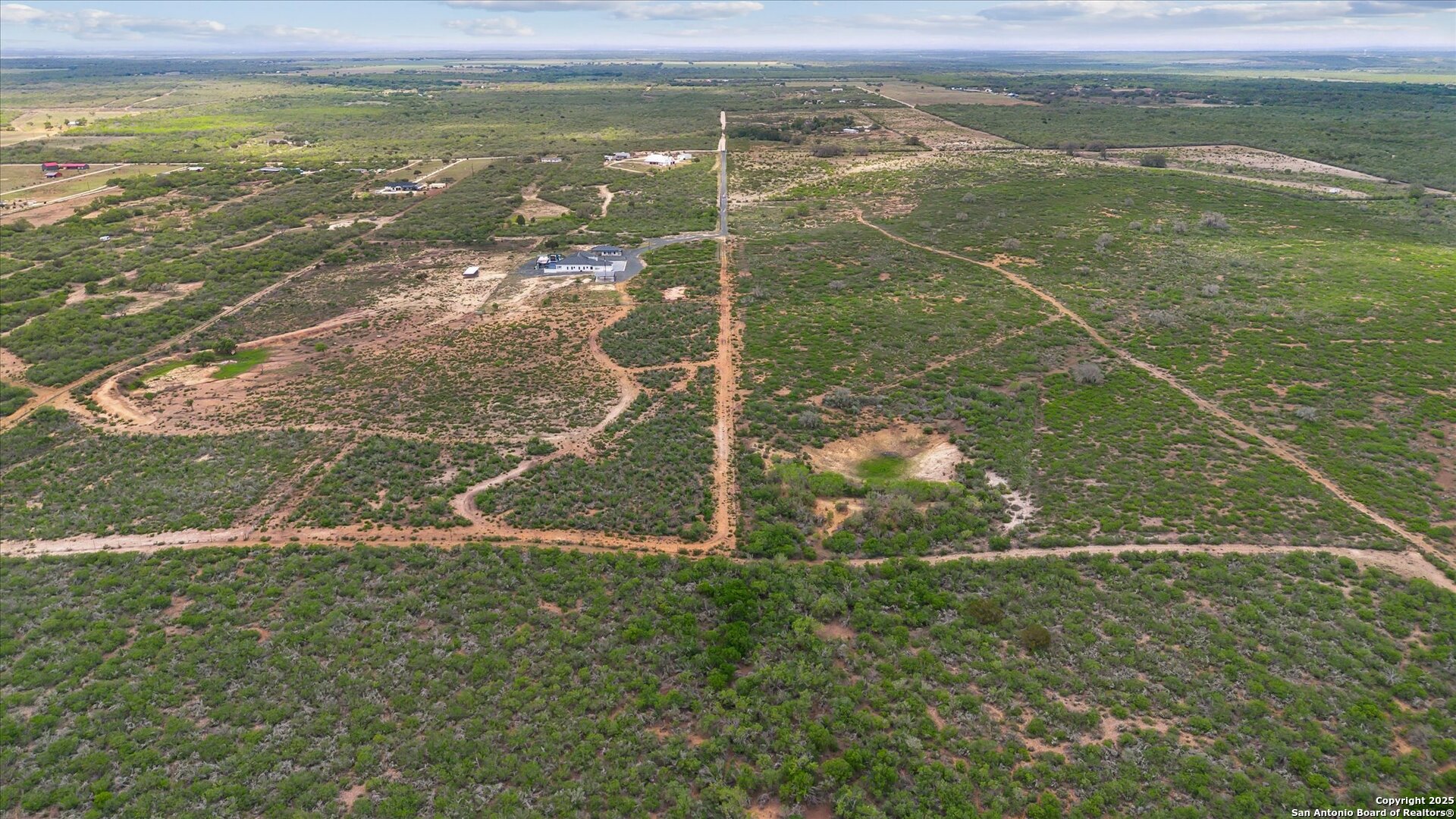 1799 County Road 651 Devine, TX 78016 - Photo 69 of 72 a view of a yard