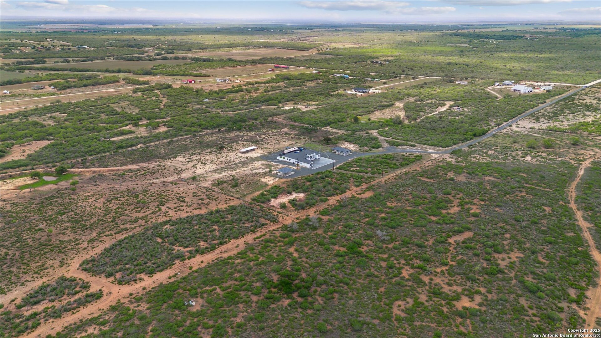 1799 County Road 651 Devine, TX 78016 - Photo 70 of 72 a view of an ocean from a yard