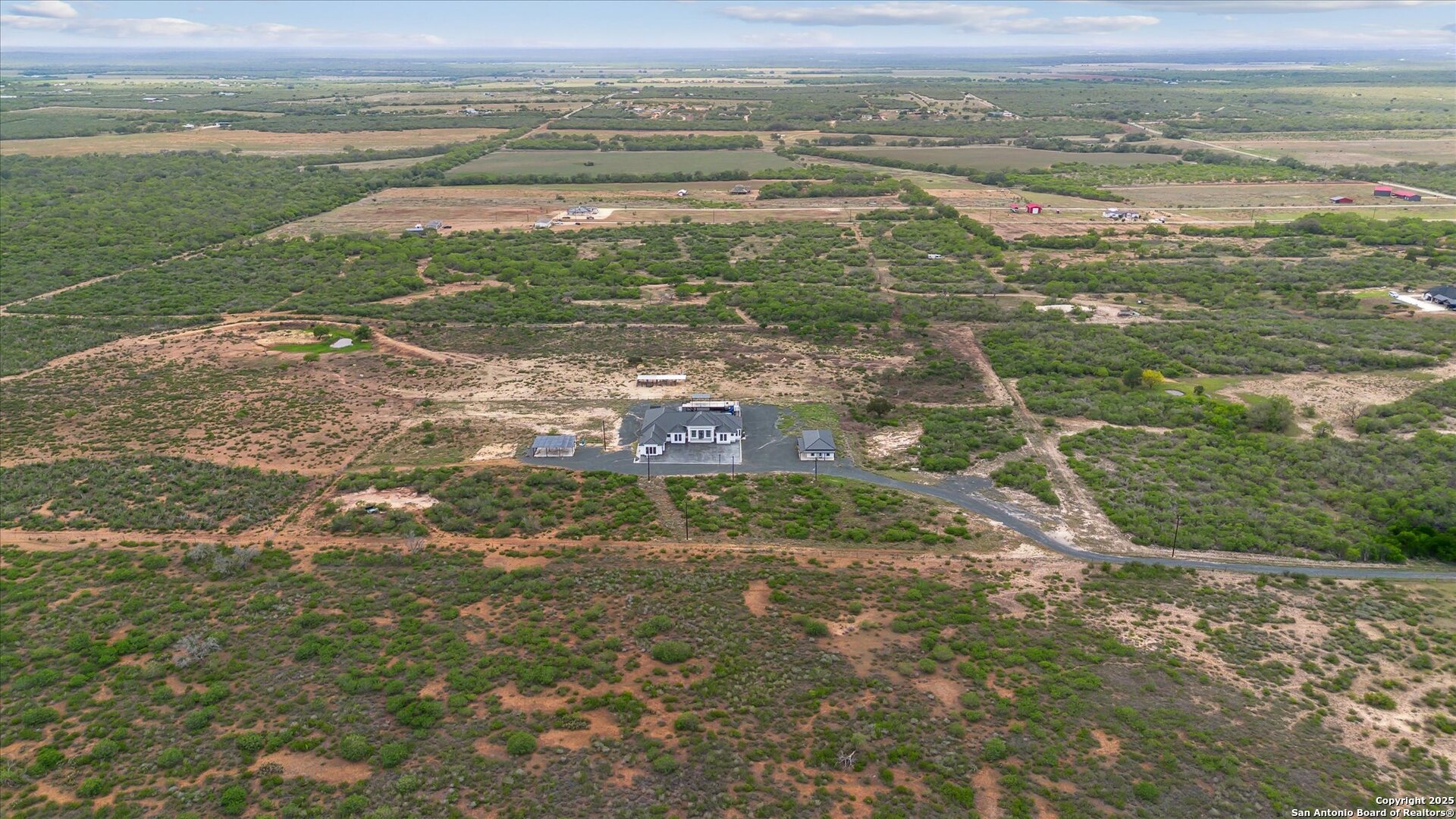 1799 County Road 651 Devine, TX 78016 - Photo 71 of 72 a view of a city with an ocean view