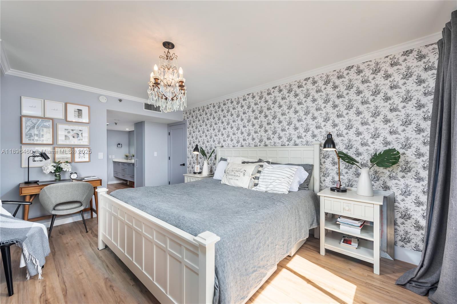 650 Ocean Drive, Unit 10E Key Biscayne, FL 33149 - Photo 15 of 20 a bedroom with bed and wooden floor