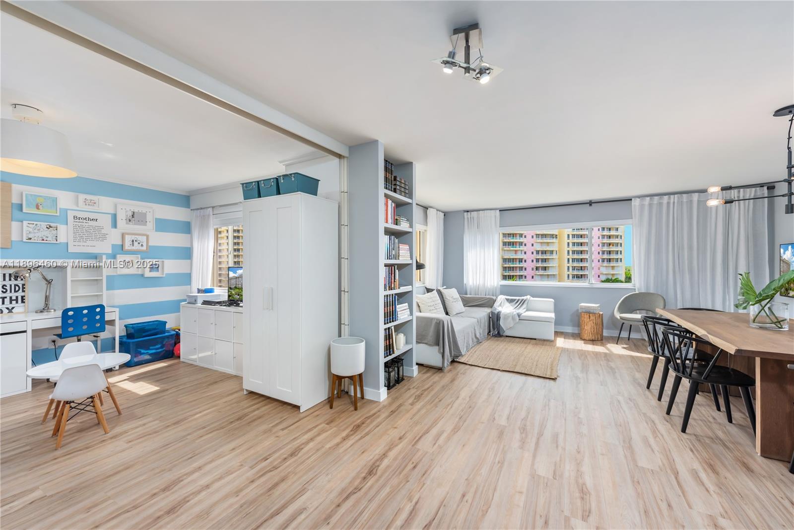 650 Ocean Drive, Unit 10E Key Biscayne, FL 33149 - Photo 3 of 20 a living room with furniture and a wooden floor