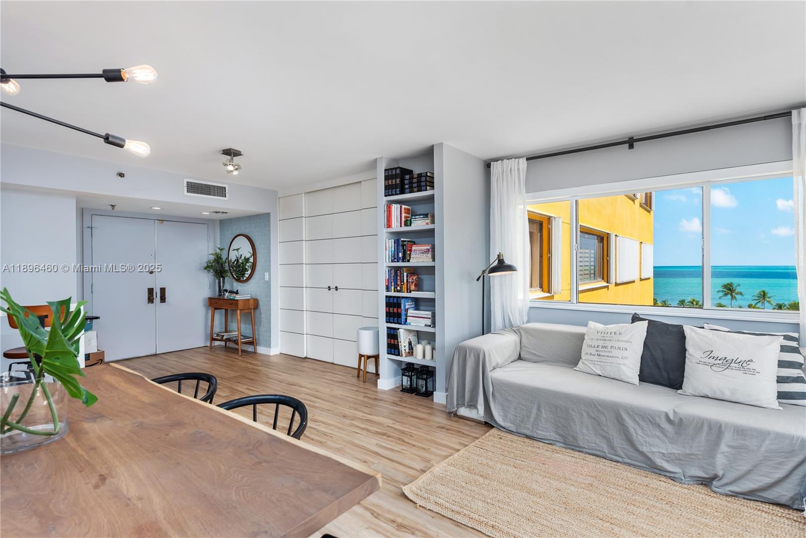 650 Ocean Drive, Unit 10E Key Biscayne, FL 33149 - Photo 6 of 20 a living room with furniture and a large window