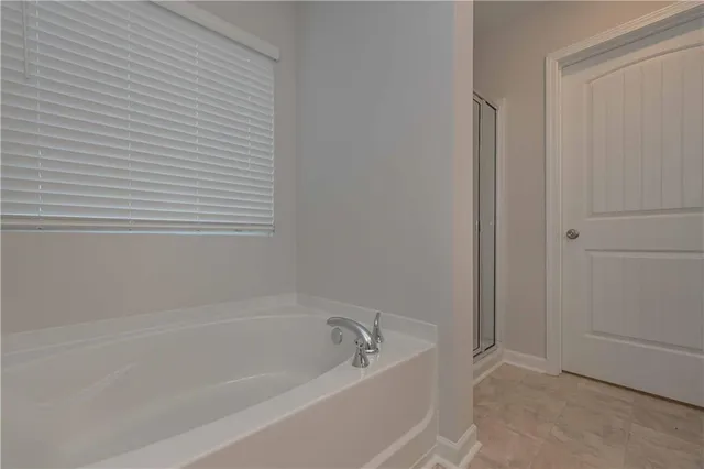 a bathroom with a bathtub