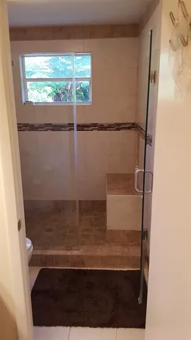 a bathroom with a sink double vanity and a mirror