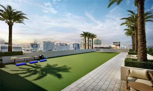 a view of a swimming pool outdoor seating