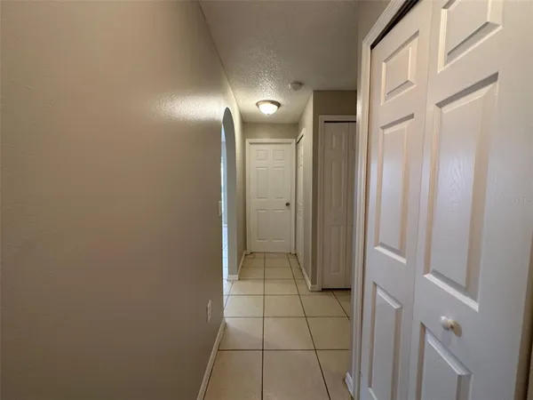 a bathroom with a mirror and a shower