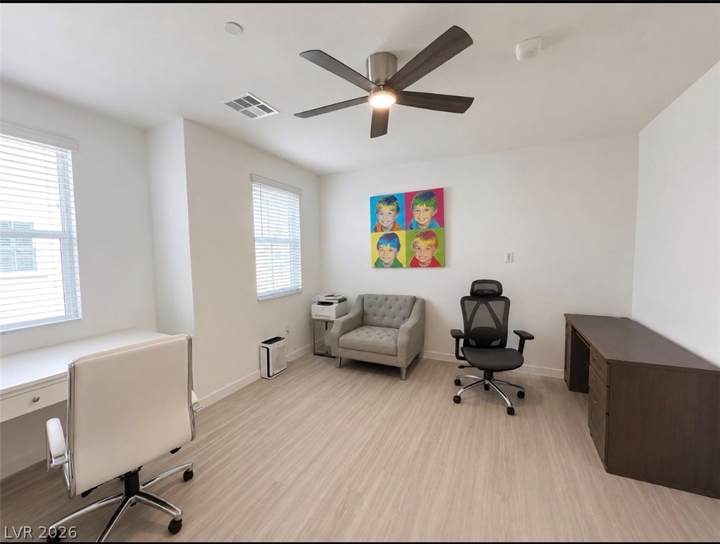 2555 Hampton Road, Unit 4205 Henderson, NV 89052 - Photo 21 of 52 Bright and airy workspace, offering a clean aesthetic and functional layout.