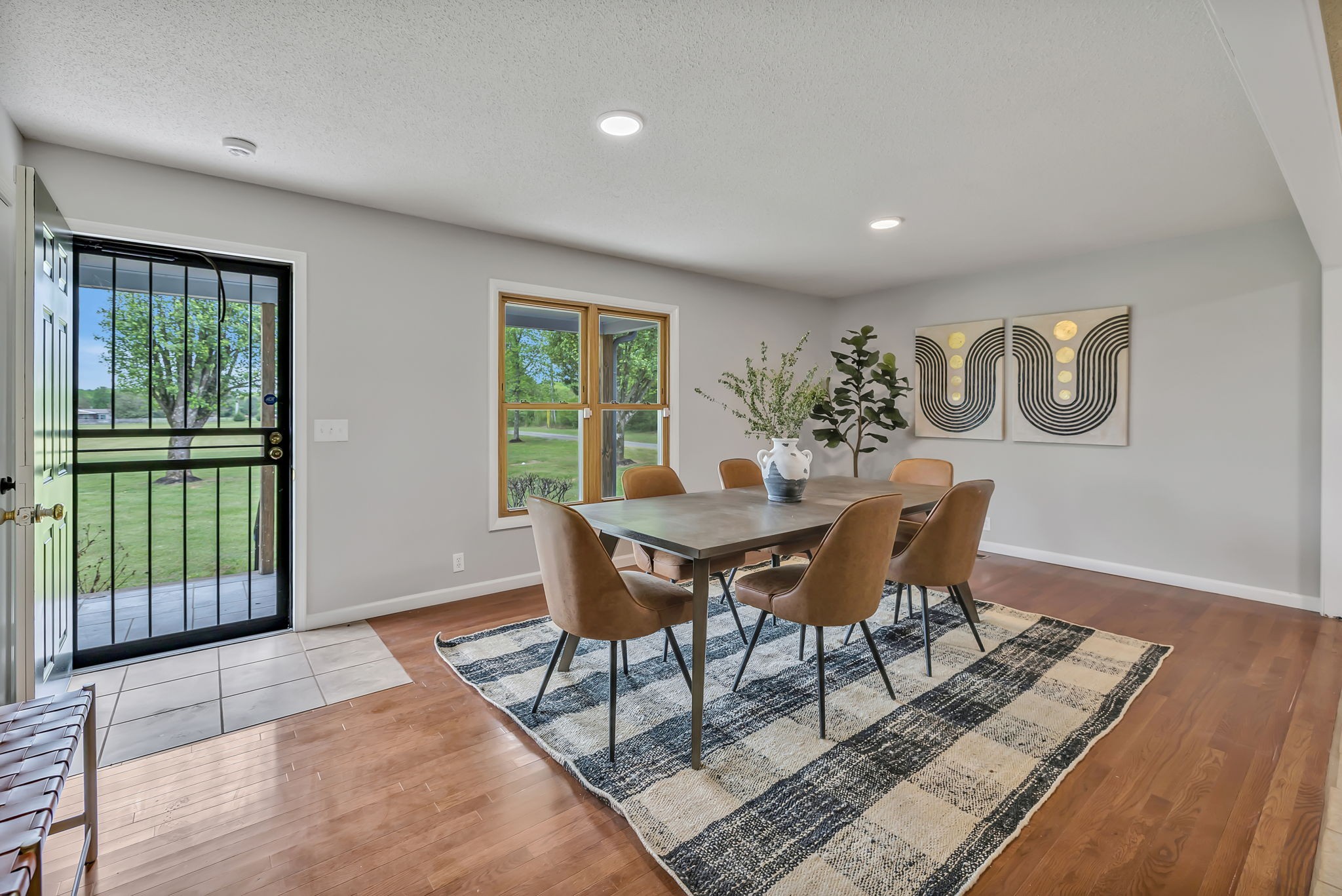 7068 Miller Road Christiana, TN 37037 - Photo 13 of 52 a view of a dining room with furniture and wooden floor