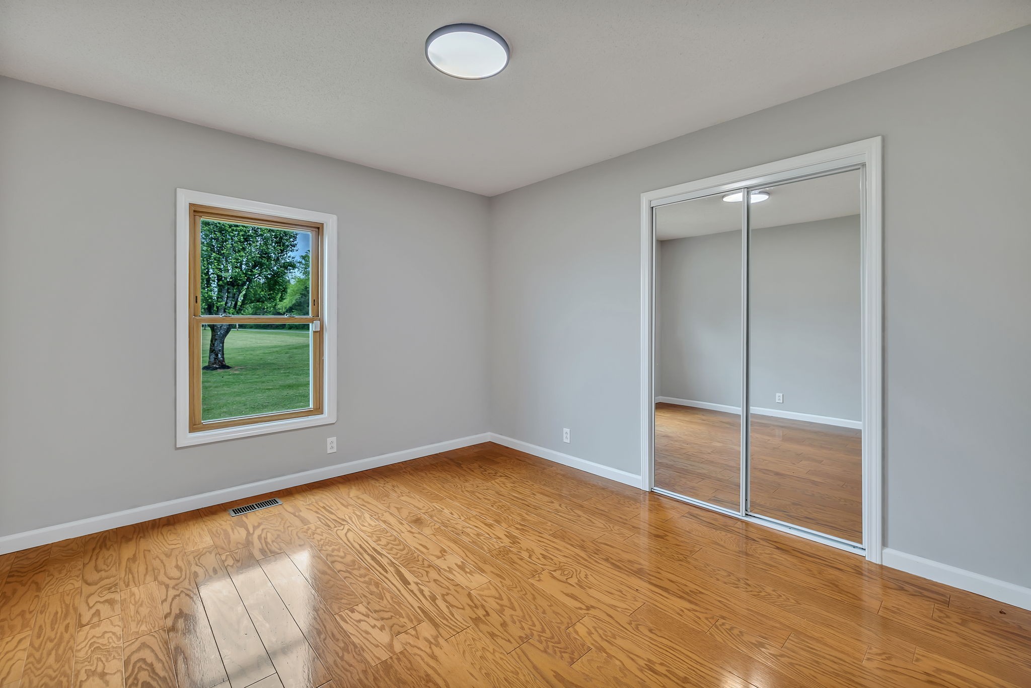 7068 Miller Road Christiana, TN 37037 - Photo 31 of 52 an empty room with window and closet area
