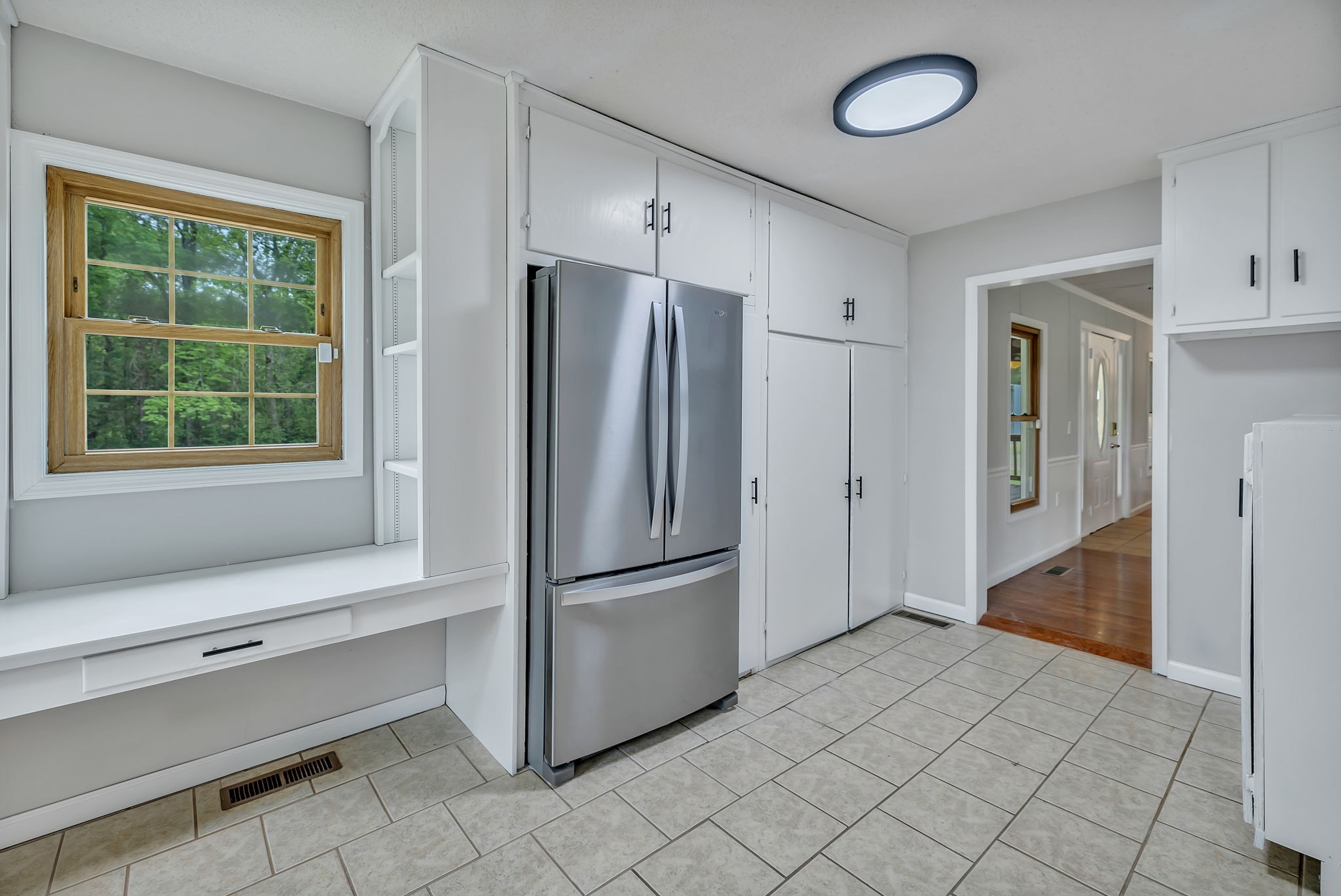 7068 Miller Road Christiana, TN 37037 - Photo 35 of 52 a kitchen with a refrigerator and countertop