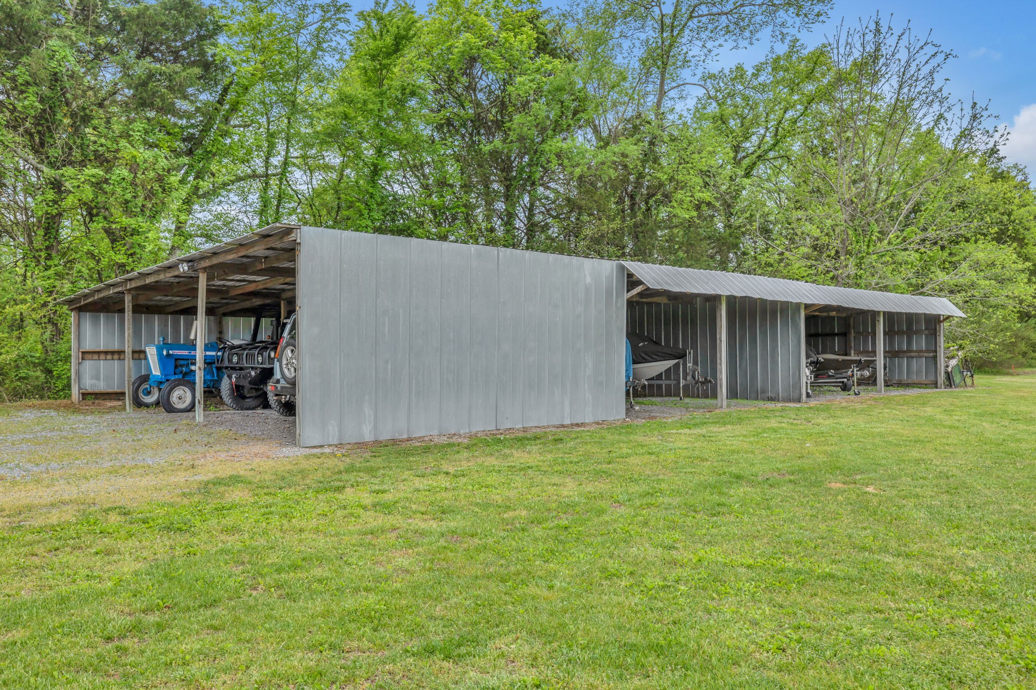 7068 Miller Road Christiana, TN 37037 - Photo 41 of 52 a backyard of a house with table and chairs
