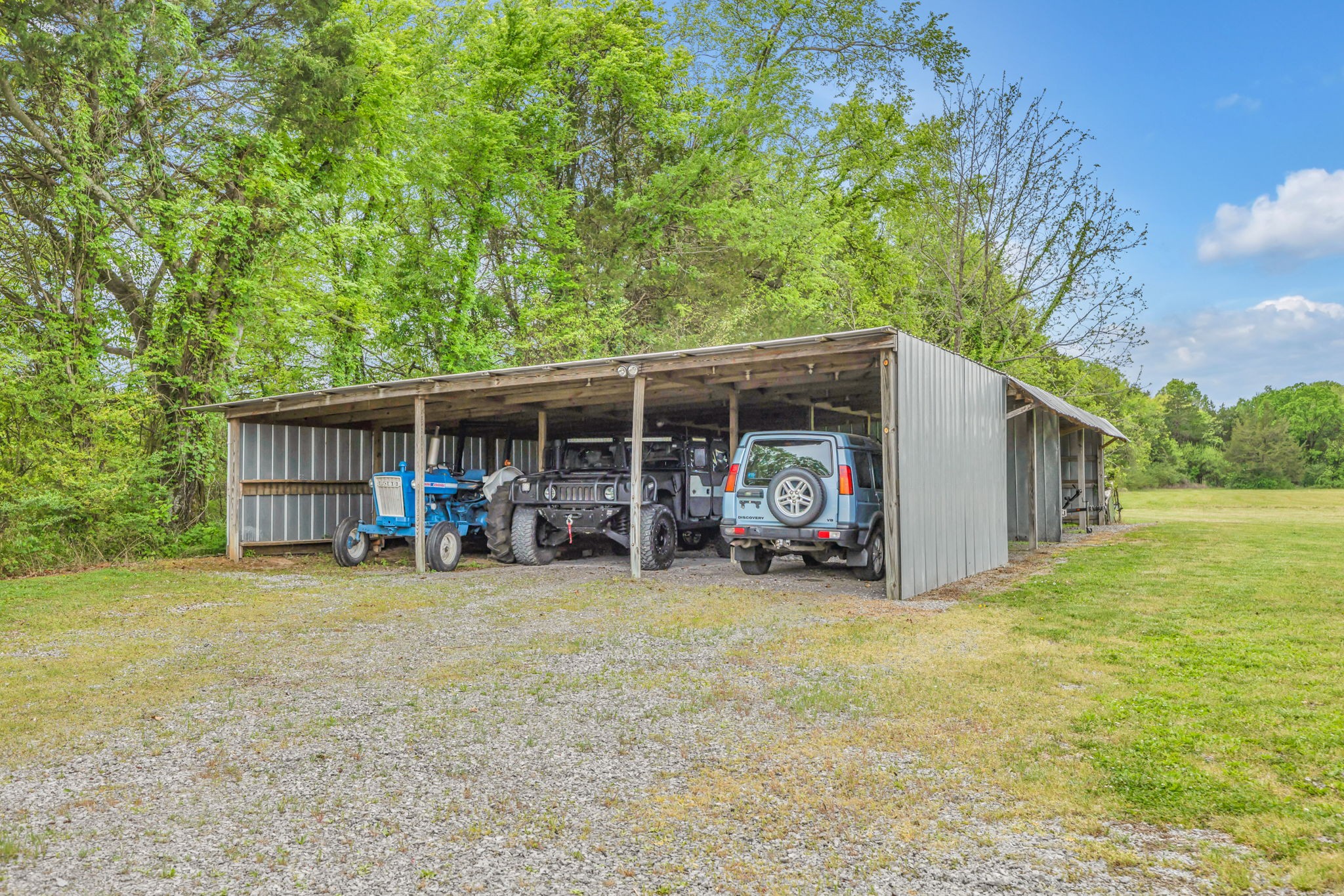 7068 Miller Road Christiana, TN 37037 - Photo 42 of 52 a view of a house with backyard porch and sitting area
