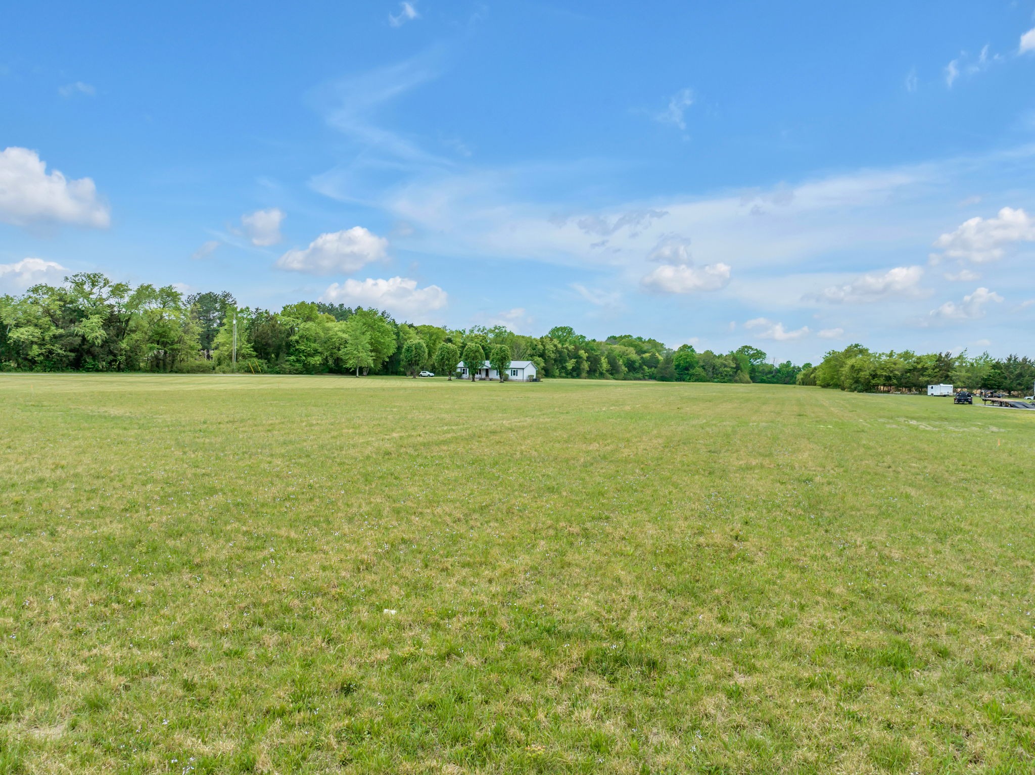 7068 Miller Road Christiana, TN 37037 - Photo 44 of 52 a view of a lake and a yard
