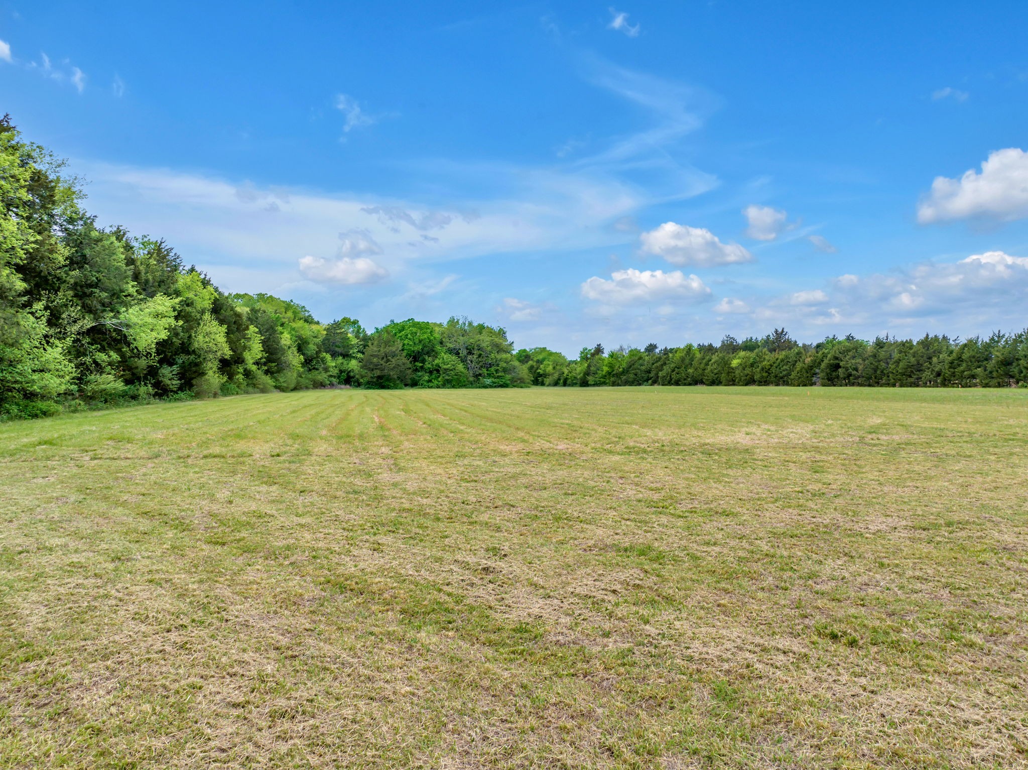7068 Miller Road Christiana, TN 37037 - Photo 47 of 52 a view of a lake and a yard
