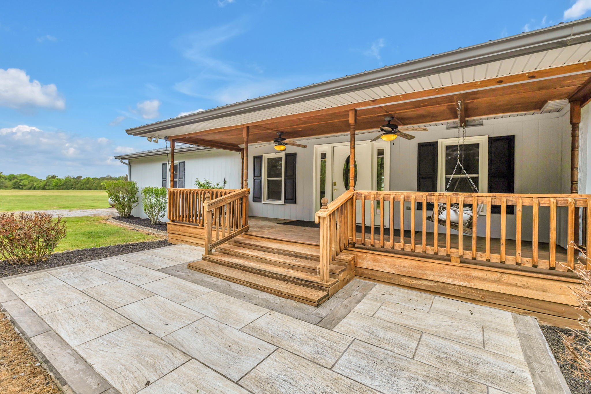 7068 Miller Road Christiana, TN 37037 - Photo 5 of 52 a view of a chair and tables in the patio