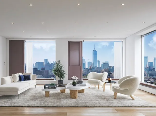 a living room with furniture and a potted plant