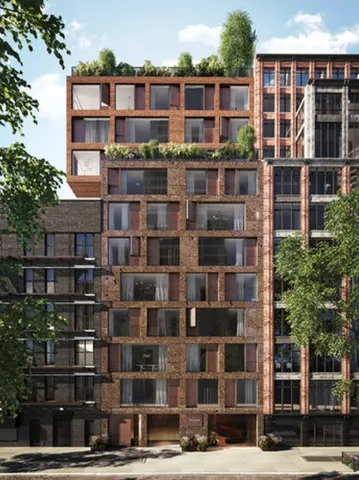 a front view of a building with a street