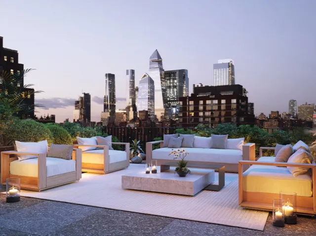 a outdoor space with patio the couches and a potted plant on the table