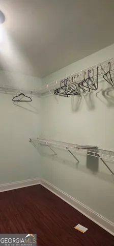 a view of a room with racks on the wall