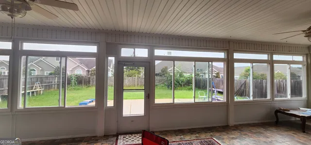 a view of a bedroom and window