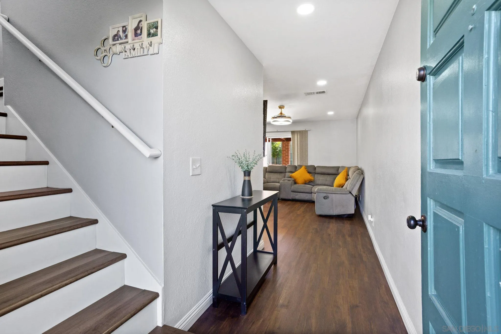 2012 Terracina Circle Spring Valley, CA 91977 - Photo 3 of 34 a living room with furniture and a wooden floor