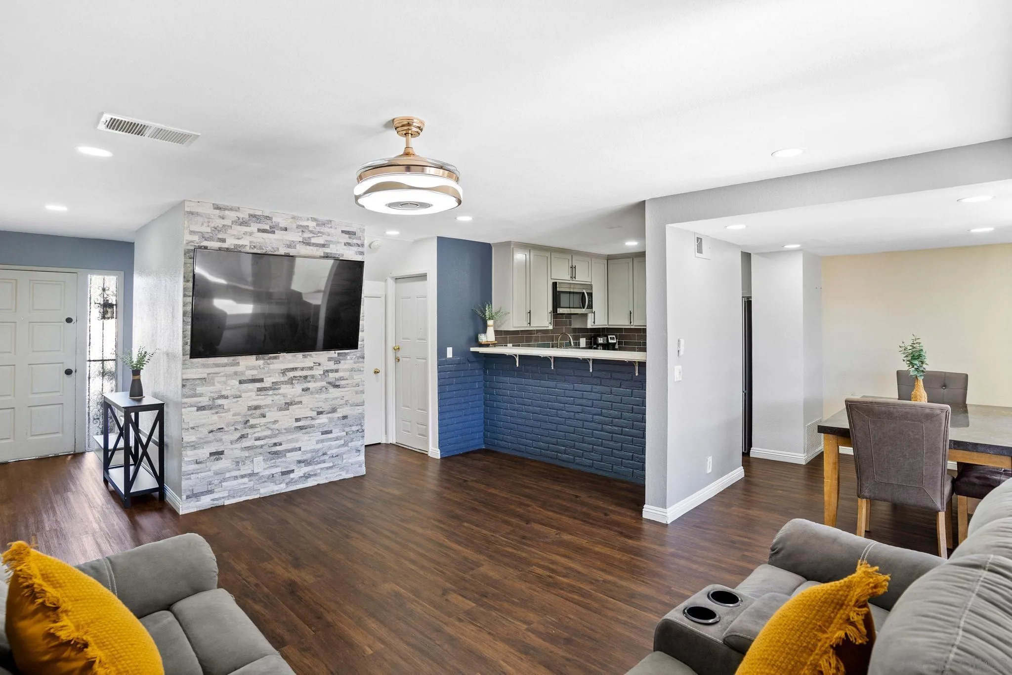 2012 Terracina Circle Spring Valley, CA 91977 - Photo 5 of 34 a living room with furniture and flat screen tv