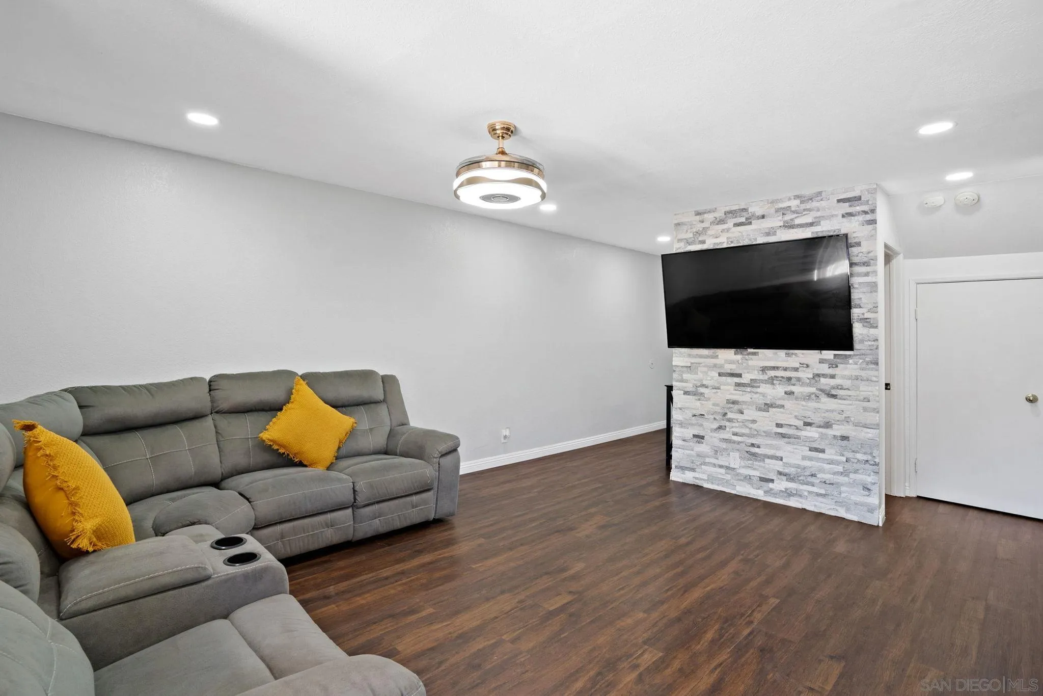 2012 Terracina Circle Spring Valley, CA 91977 - Photo 7 of 34 a living room with furniture and a flat screen tv