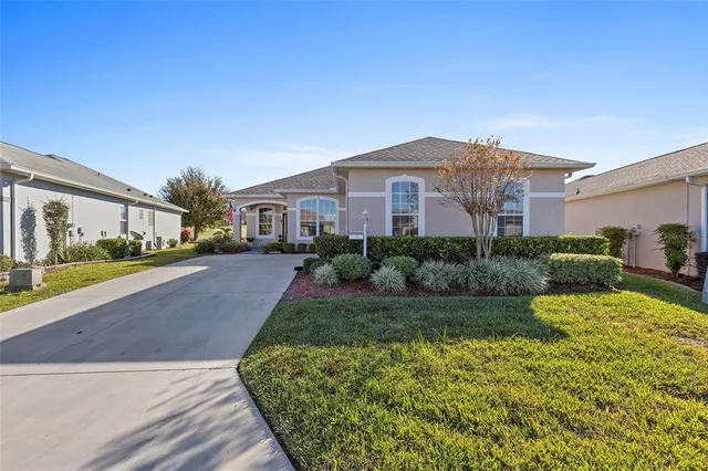 a view of a house with a garden