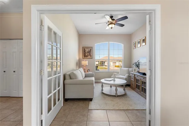 a living room with furniture and a window