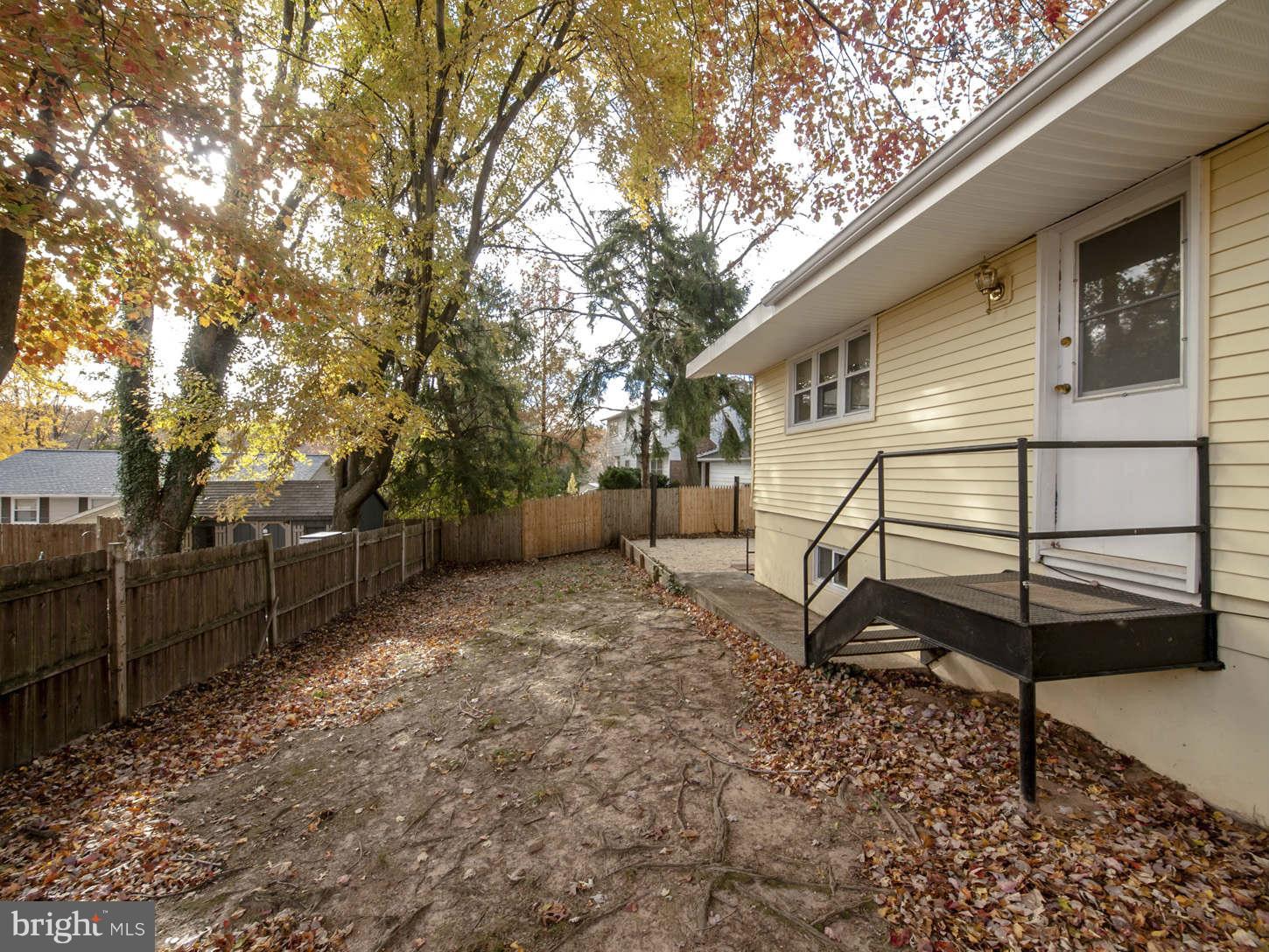 12906 Broadmore Road Silver Spring, MD 20904 - Photo 11 of 27 a house with trees in front of it