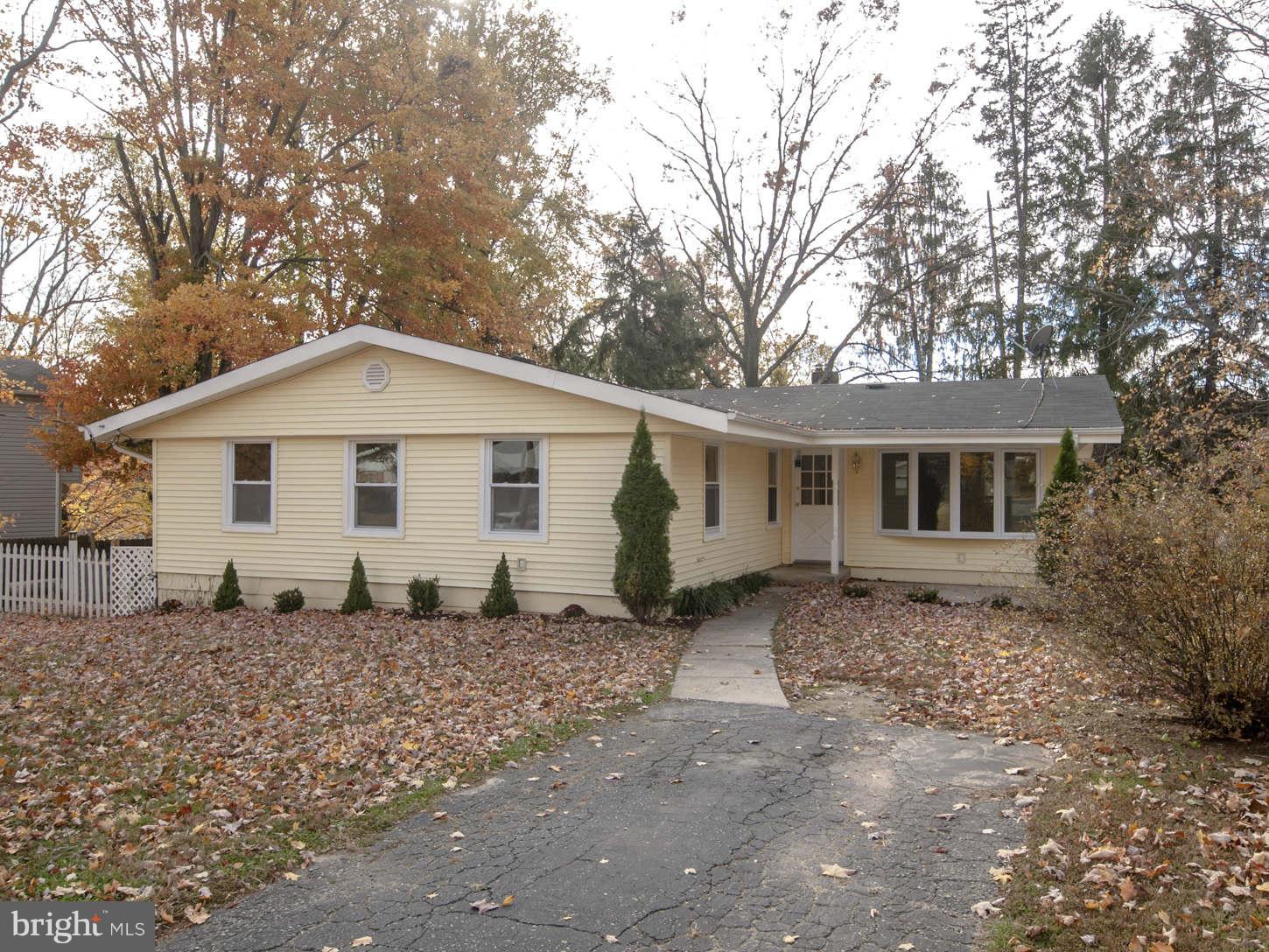 12906 Broadmore Road Silver Spring, MD 20904 - Photo 25 of 27 a view of a house with a yard