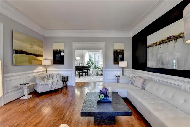 a kitchen with stainless steel appliances granite countertop a stove and a microwave