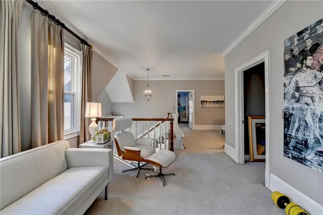 a bed room with a bed and a balcony