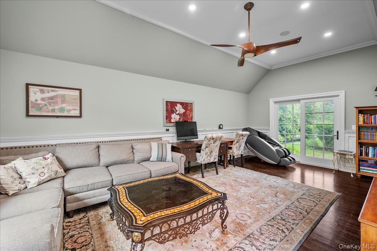 7 Harcourt Road Scarsdale, NY 10583 - Photo 16 of 34 a living room with furniture and a rug
