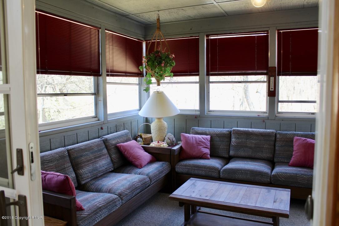 108 Gold Finch Road Bushkill, PA 18324 - Photo 14 of 32 a living room with furniture and a window