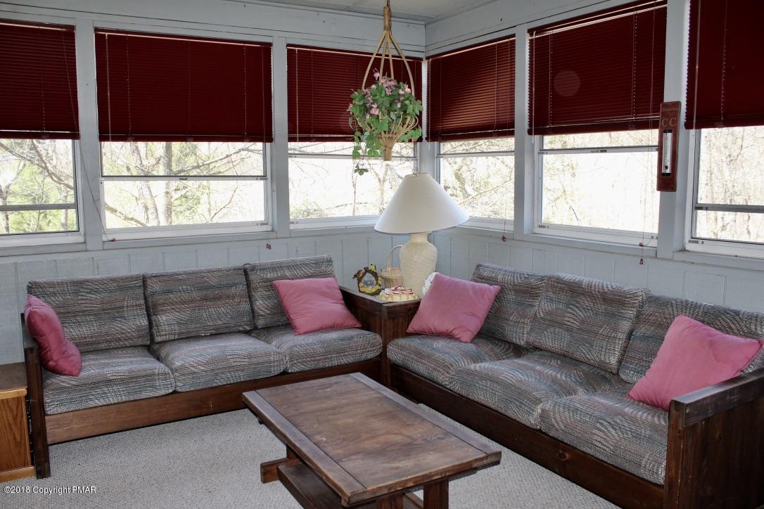 108 Gold Finch Road Bushkill, PA 18324 - Photo 15 of 32 a living room with furniture and a large window
