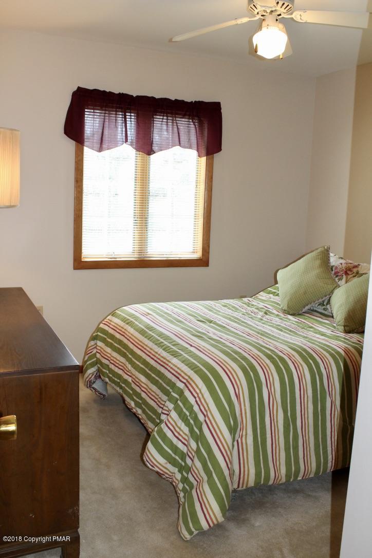 108 Gold Finch Road Bushkill, PA 18324 - Photo 17 of 32 a bedroom with a bed and window