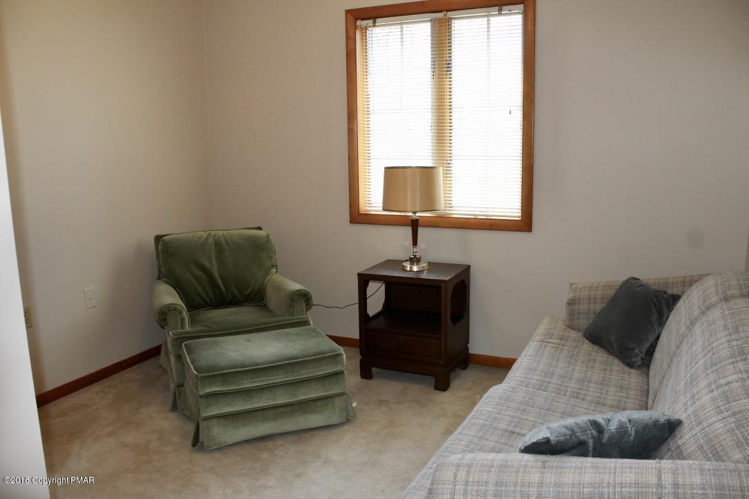 108 Gold Finch Road Bushkill, PA 18324 - Photo 19 of 32 a living room with furniture and a window