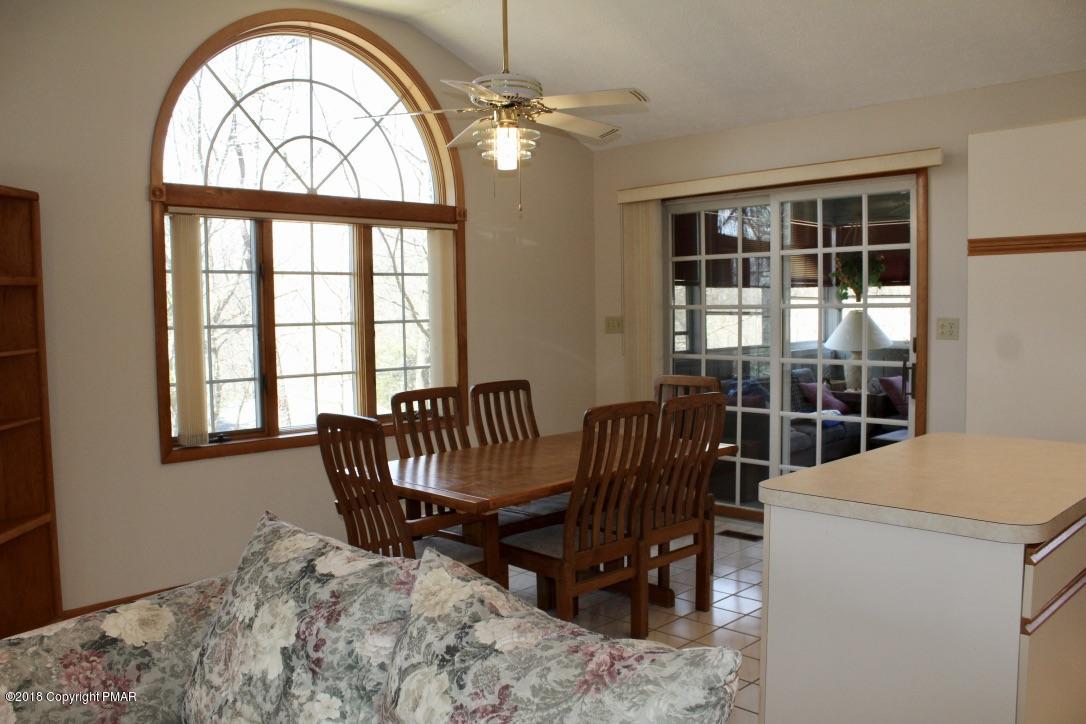 108 Gold Finch Road Bushkill, PA 18324 - Photo 8 of 32 a view of a livingroom with furniture and window