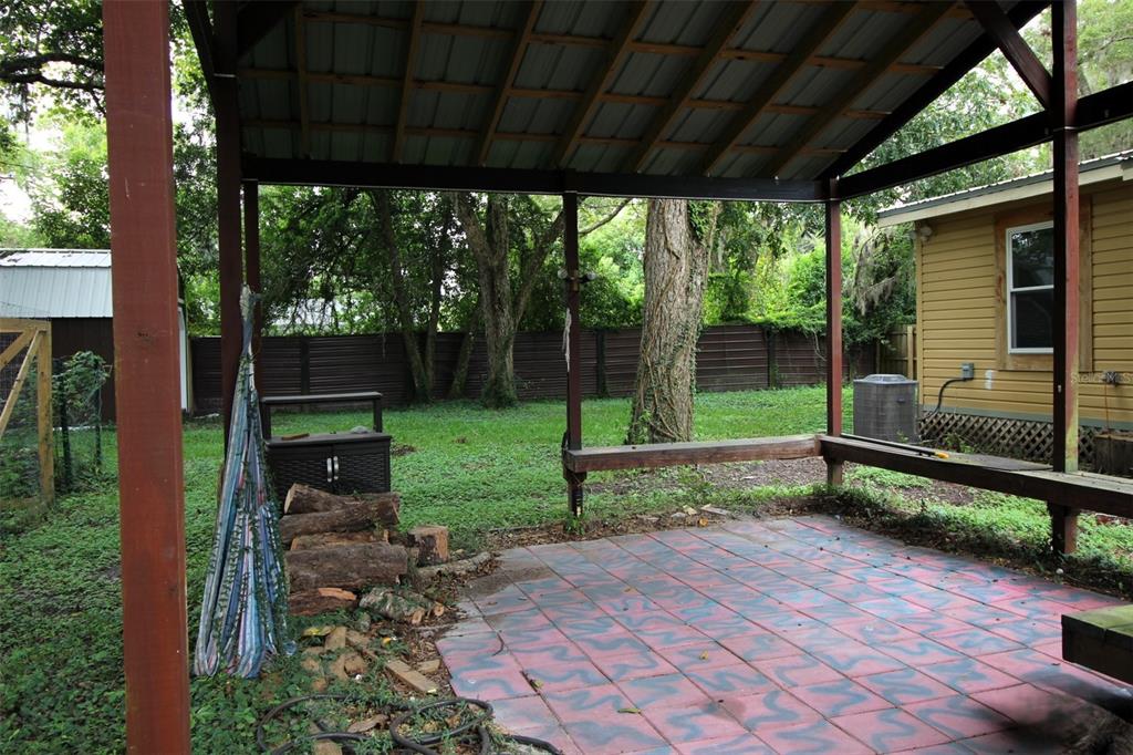 17091 Southwest 138th Lane Archer, FL 32618 - Photo 14 of 19 a garden view with a seating space
