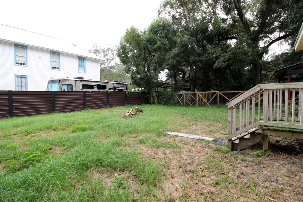 17091 Southwest 138th Lane Archer, FL 32618 - Photo 19 of 19 a view of backyard with deck and garden